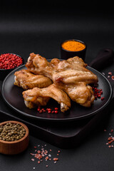 Baked chicken wings with salt, spices and herbs