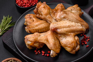 Baked chicken wings with salt, spices and herbs