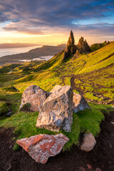 Beautiful golden morning light at The Old Man of Storr on The Isle of Skye, Scotland, UK. Popular tourist sightseeing destinations. - 577795056