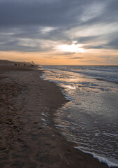 Dutch beach at sunset - obrazy, fototapety, plakaty