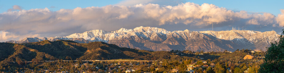 Snow covered mountains over the city of Eagle Rock in Los Angeles, CA