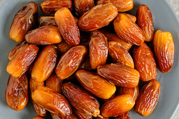 Dried dates closeup.Edible fruits date palm.