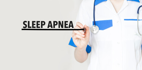 Doctor writing text sleep apnea with marker, medical concept