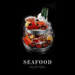 Seafood platter isolated on black background. Plate with crab claws, salmon, tuna, shrimps,...