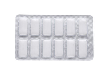 Blister with chewing gums on white background, top view