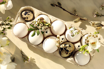 Festive composition with eggs and floral decor on windowsill indoors, flat lay. Happy Easter