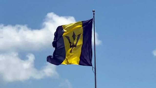 The national flag of Barbados unveiled on 30 November 1966, island's first Independence Day. Triband of ultramarine and gold with black broken trident. Blue for ocean and sky, yellow for sand.