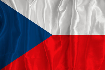 The flag of the Czech Republic on a silk background is a great national symbol. Fabric texture The official state symbol of the country..
