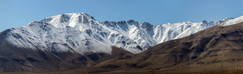 Southern Sierra Nevada snowcapped mountains shown in Inyo Couty, California.