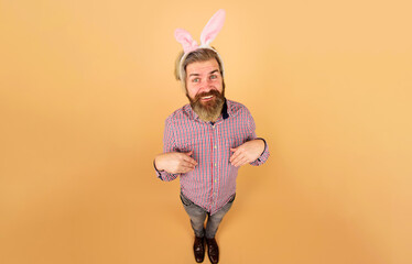Happy Easter day. Bearded man in rabbit ears. Preparation for Easter. Rabbit man. Easter...