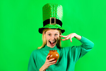Saint Patricks Girl. Patricks woman in top green hat with pot of gold. Smiling woman in Leprechaun...
