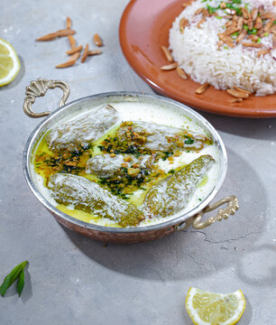 Zucchini stuffed with meat and laban al jamid from the Syrian Cuisine, its name food is Sheikh Al-Mahshi