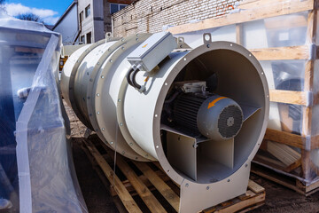 Naklejka premium Cooling fan with electric engine of condition or heating and drying system in warehouse