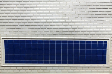 Empty white and blue tiles background for advertisement