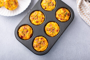 Breakfast egg muffins or egg bites with bacon and cheddar