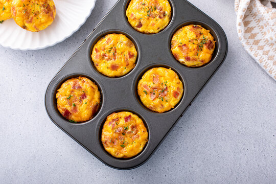 Breakfast egg muffins or egg bites with bacon and cheddar