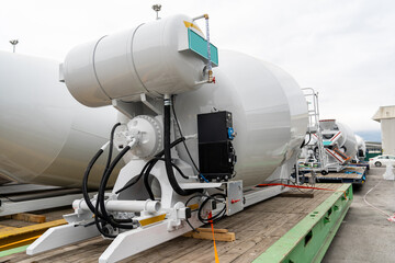 Modern new concrete mixers waiting to be transported on the conveyor