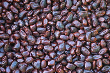 dark brown tamarind seed background