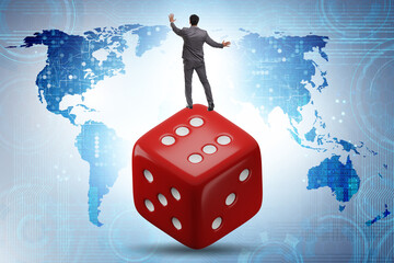 Businessman in uncertainty concept with dice