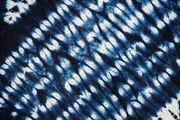 Indigo dyed fabric pattern background.