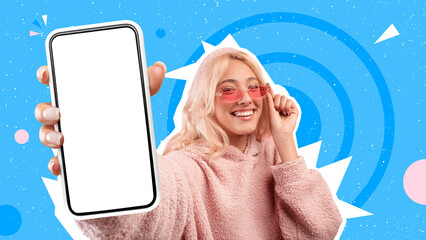 Happy young blonde woman showing phone with blank screen, mockup