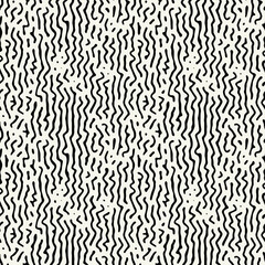 Vector seamless pattern. Abstract op art texture with bold monochrome wavy stripes. Creative background with distorted lines. Decorative black and white striped design.
