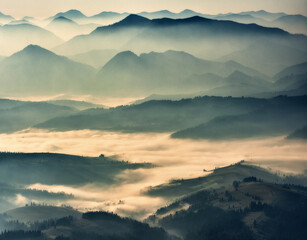 Mountain silhouettes in the fog. Graphic landscape on the theme of mountains