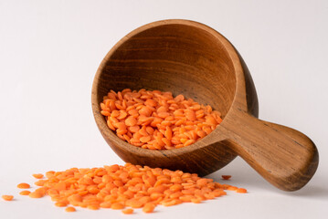 Uncooked Red Lentils Spilled from a Scoop