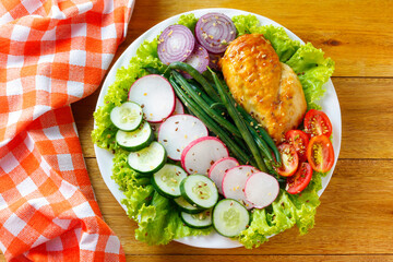 Fresh raw vegetable salad of tomato, chicken, mushrooms, onion, radish and cauliflower. Healthy and detox food concept. Ketogenic diet. green salad