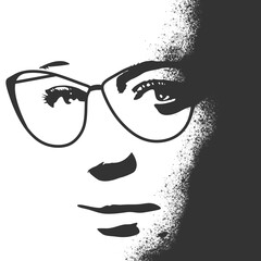 Beauty and fashion. Elegant silhouette of a woman wearing spectacles. Particles splash painting