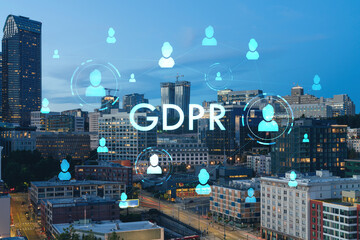 Naklejka premium Seattle aerial skyline panorama of downtown skyscrapers at sunset, Washington USA. GDPR hologram, concept of data protection regulation and privacy for all individuals