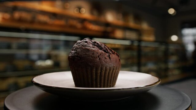 Close-up bakery - delicious muffin on a rotating surface