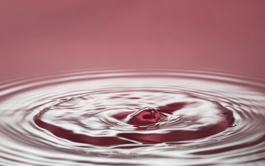 Purple  water splashing and ripple surface.