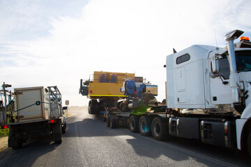 Fototapeta na wymiar Transport of Oversize Heavy Machinery