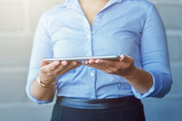 Hands, internet and business woman holding a tablet connected to wifi for the web, website and app for technology. Person, corporate and employee working for digital marketing or social media