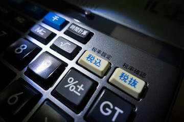 Fototapeta na wymiar 計算機の消費税ボタンのクローズアップイメージ