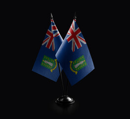 Small national flags of the British Virgin Islands on a black background