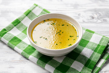 Chicken broth, stock or bouillon with vegetables