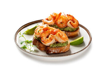 Toast or sandwich with Grilled fresh Spicy Prawns Shrimps with mashed avocado and lime slices. isolated on white background 
