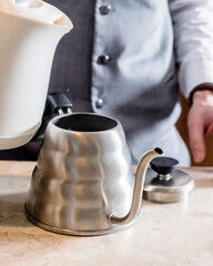 barista making coffee in restaurant