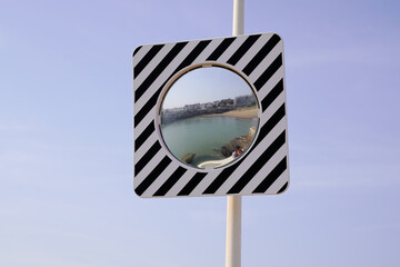 convex mirror for help car street traffic vehicle in road on safety concept in city center