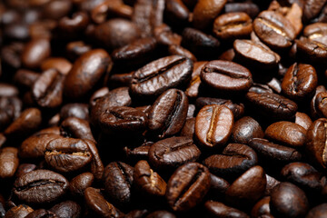 photo macro close up texture of roasted coffee beans dark, can be used as a background..
