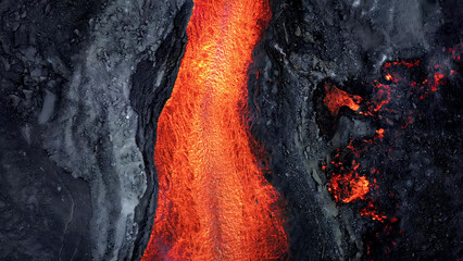 Lava flowing from a volcano on the island of Vanuatu. A unique shot from above.