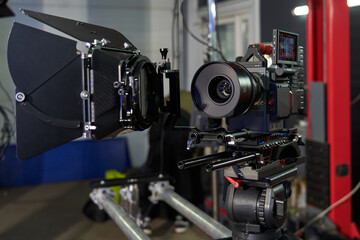 professional movie camera assembly with 35mm lens installed