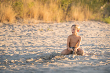 child playing on the beach summertime