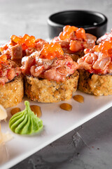 set of sushi roll in plate