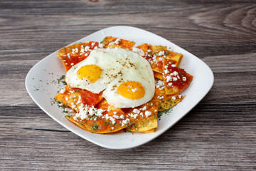 A view of a plate of chilaquiles.