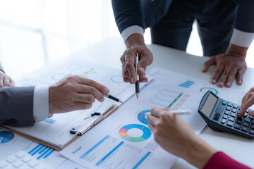 Group of business people meeting for business plan Analyze corporate growth graph and chart.