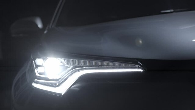 car vehicle with modern technology LED headlight for car transportation at night with driver start and turn on the light and high beam for clear road vision at night