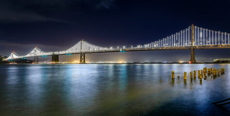 Naklejka na ściany i meble San Francisco Bay Bridge lights the dey before they turn off on March 5th, 2023